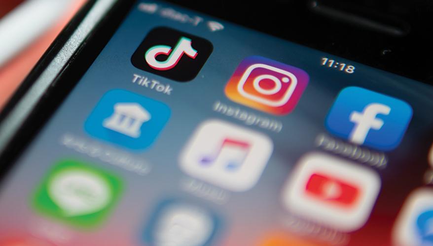 Bangkok, Thailand - August 22, 2019 : iPhone 7 showing its screen with TikTok and other social media application icons.