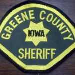 Emergency responders at a rural intersection after a pickup and semi collision in Greene County Iowa