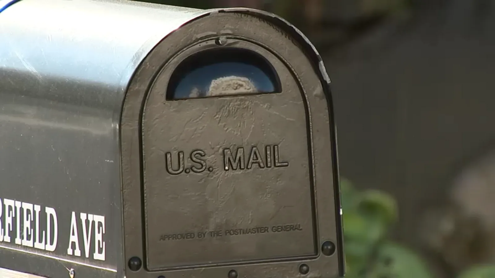Westport police investigate mail thefts near clustered residential mailboxes in a neighborhood