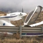 A small plane sits on Interstate 80 after an emergency crash landing outside Reno, Nevada
