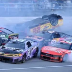 Joey Logano’s car flipped upside down after a 15-car crash at Talladega Superspeedway