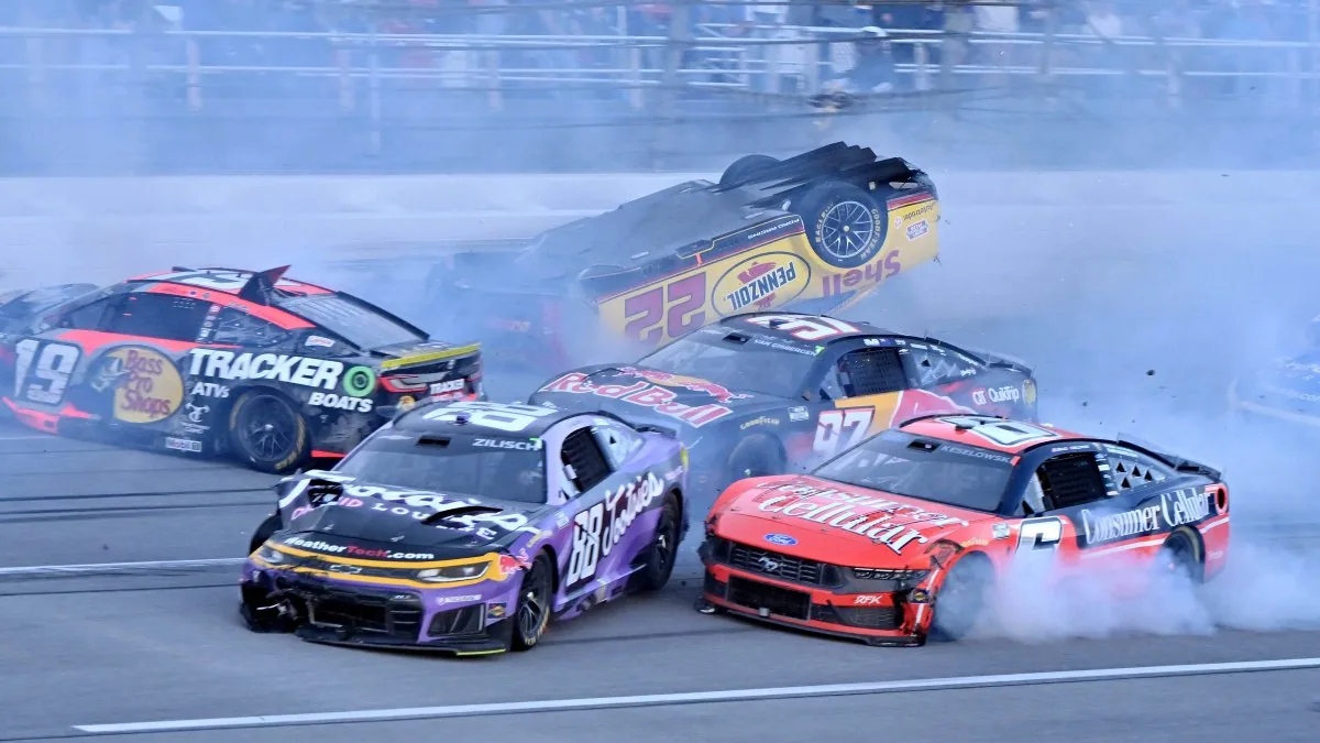 Joey Logano’s car flipped upside down after a 15-car crash at Talladega Superspeedway