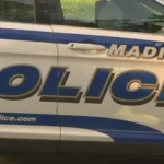 Police lights at a Madison intersection after a wrong-way crash
