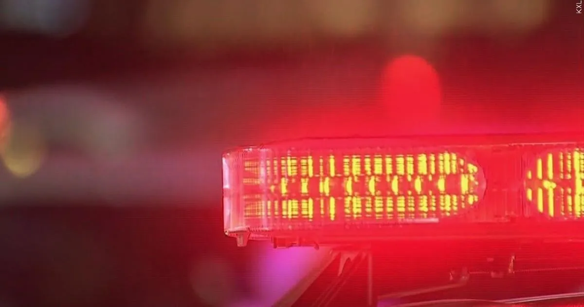 Emergency crews investigate a fatal crash scene on a highway in Iowa County, Wisconsin