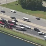 Emergency crews respond to a truck crash and chemical spill near Route 202 and Interstate 95
