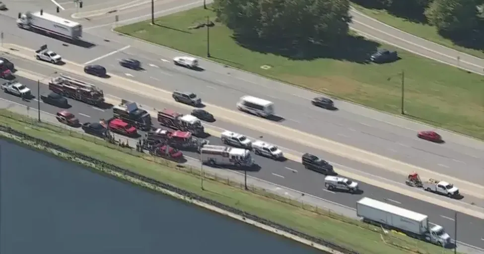 Emergency crews respond to a truck crash and chemical spill near Route 202 and Interstate 95