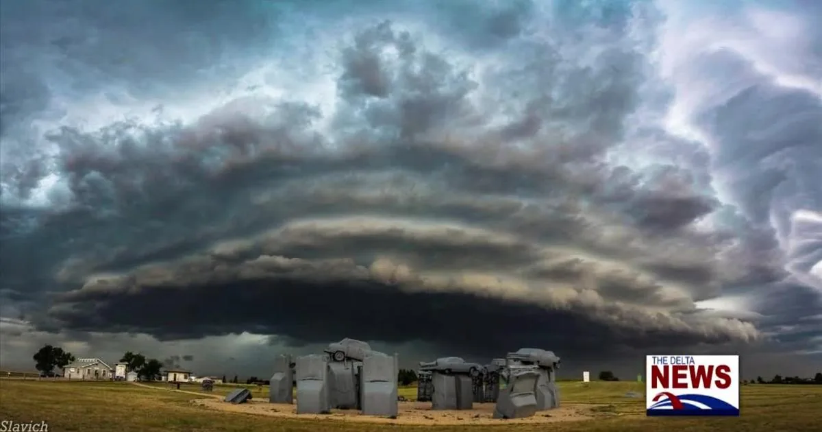 A family reviews an emergency storm plan while watching weather alerts on a phone and radio