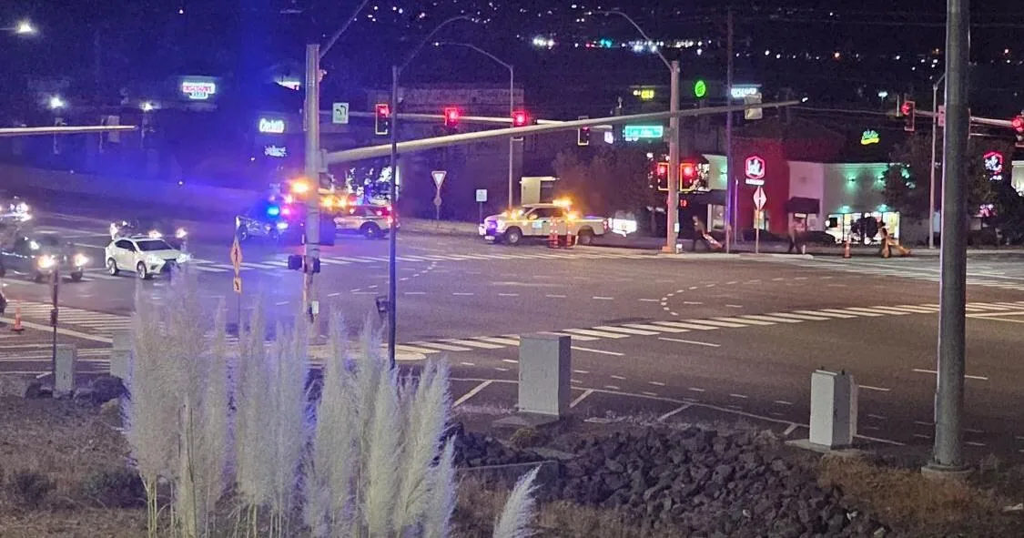 Police vehicles on a closed roadway during an overnight investigation in Sparks, Nevada