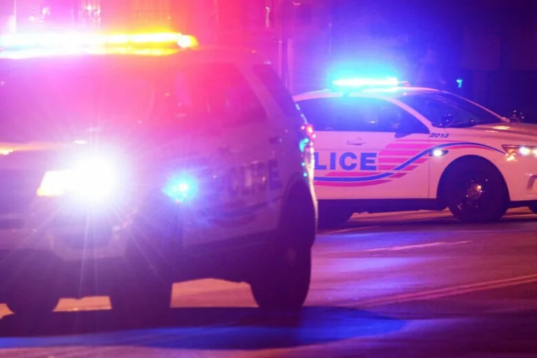 Police tape at a Southeast Washington street where an infant death investigation took place