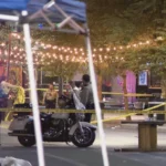 Police tape near the Las Vegas Arts District after a fatal shooting