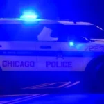 Chicago police patrol car in a city neighborhood after a series of car thefts