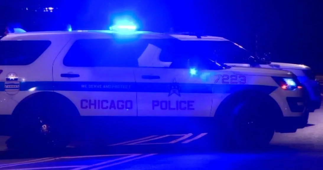 Chicago police patrol car in a city neighborhood after a series of car thefts
