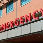 Emergency response near a Pawtucket street after a child was struck by a bus