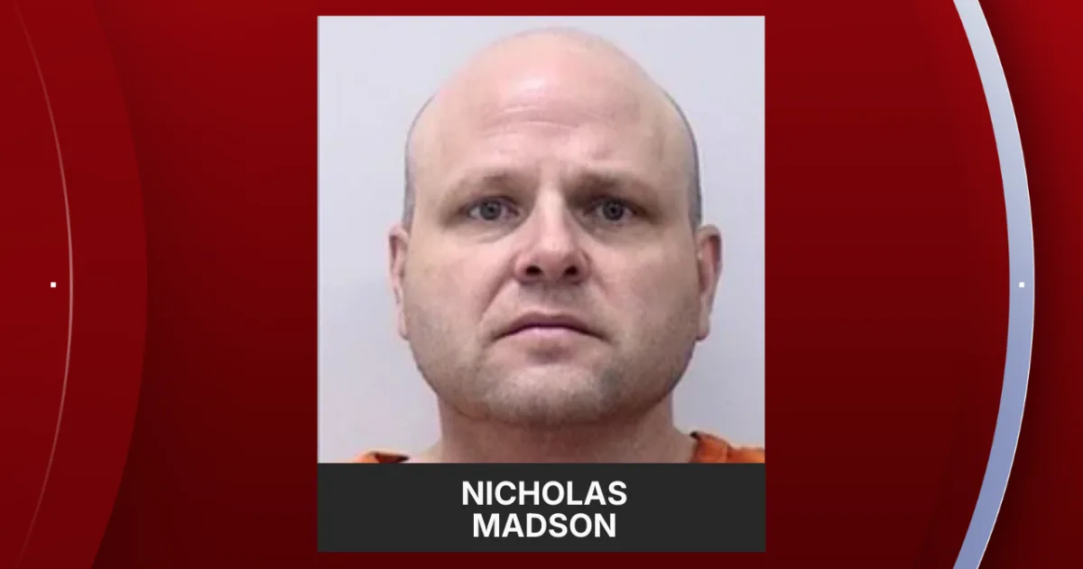 Police investigate outside a Colorado Springs charter school after a teacher's arrest