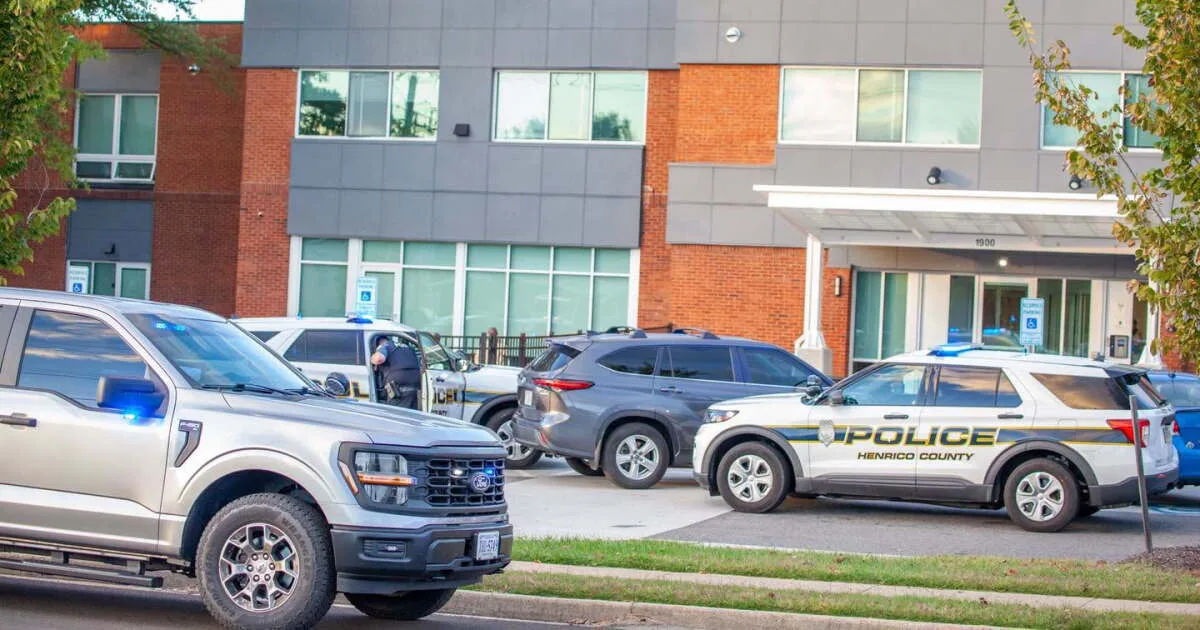 Police investigate a shooting at an apartment complex in Henrico County, Virginia