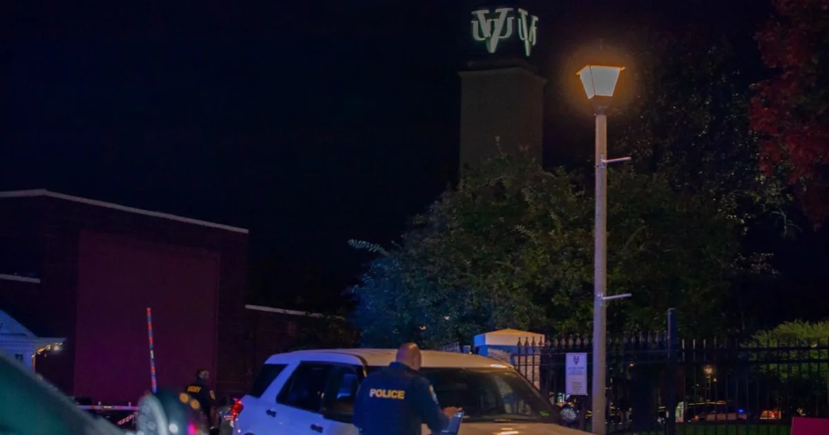 Police tape and officers near Virginia Union University after a homecoming shooting