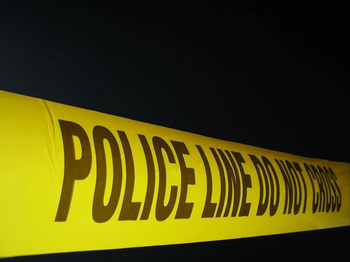 Police investigate a motorcycle crash on a roadway in Hopkinton, Rhode Island